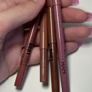 Poza reala Creion buze NYX Professional Makeup Line Loud Lip Pencil Total Baller