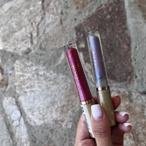 Poza reala Luciu buze Milani Hypnotic Lights Holographic Lip Topper Flashing Light